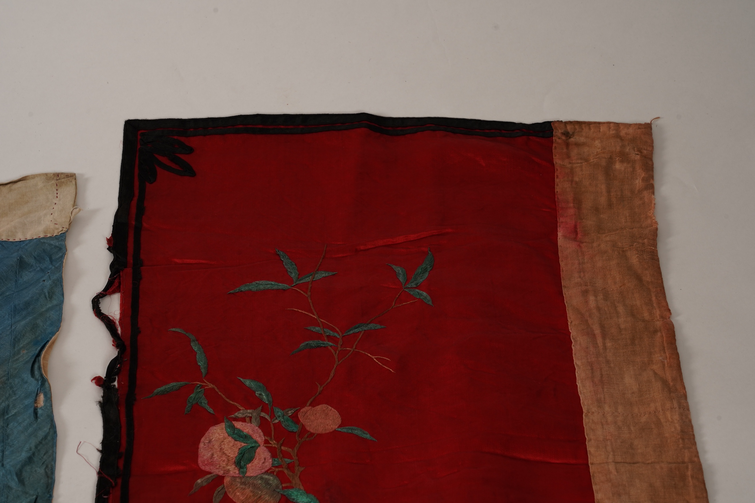 Four Chinese embroidered silk panels, late 19th/early 20th century and a similar Indian panel
